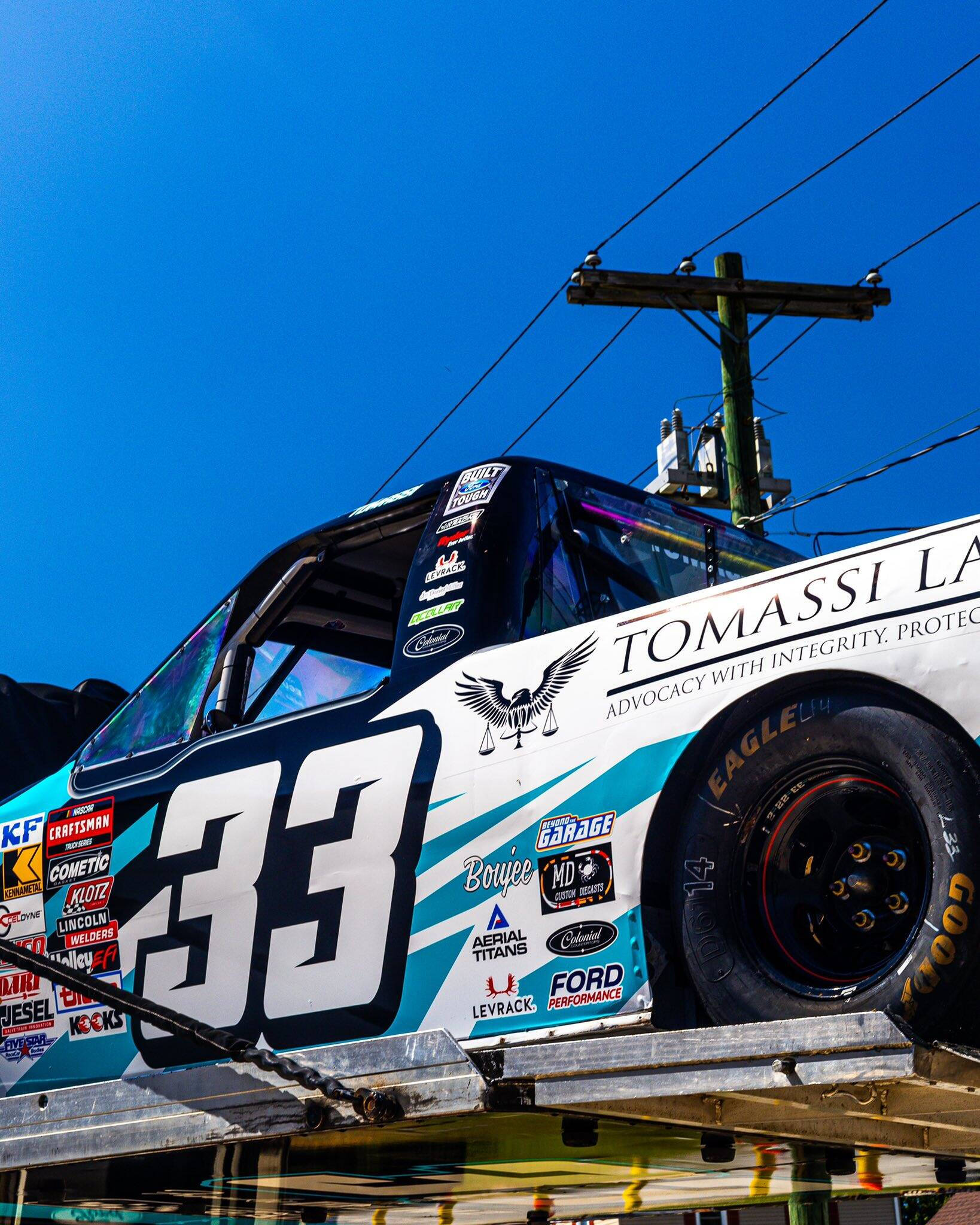 Tyler Tomassi Racing No. 33 truck featuring sponsor branding